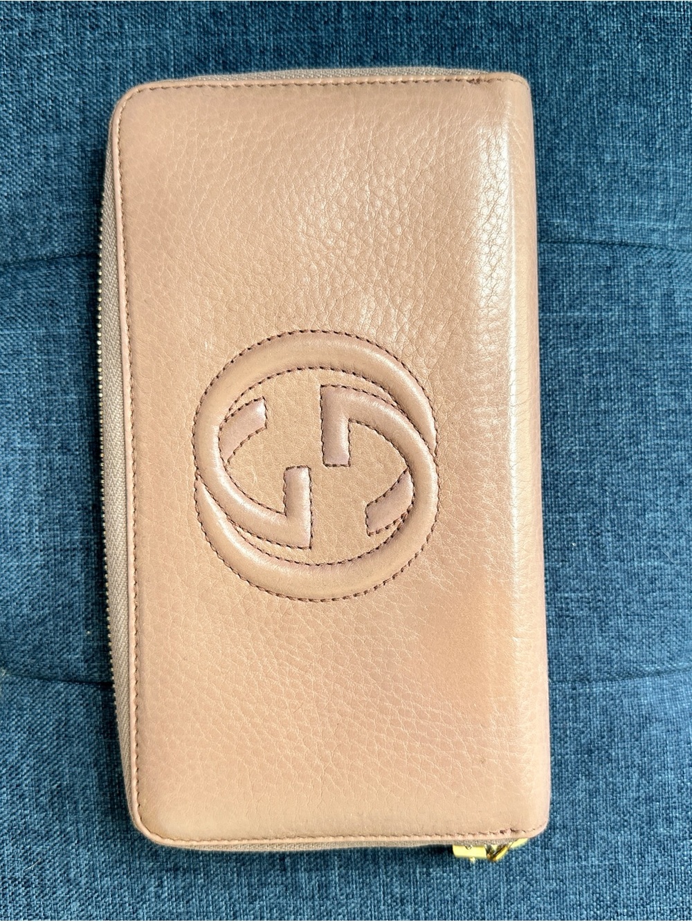Gucci Beige/Tan Embossed GG Zip Leather Wallet